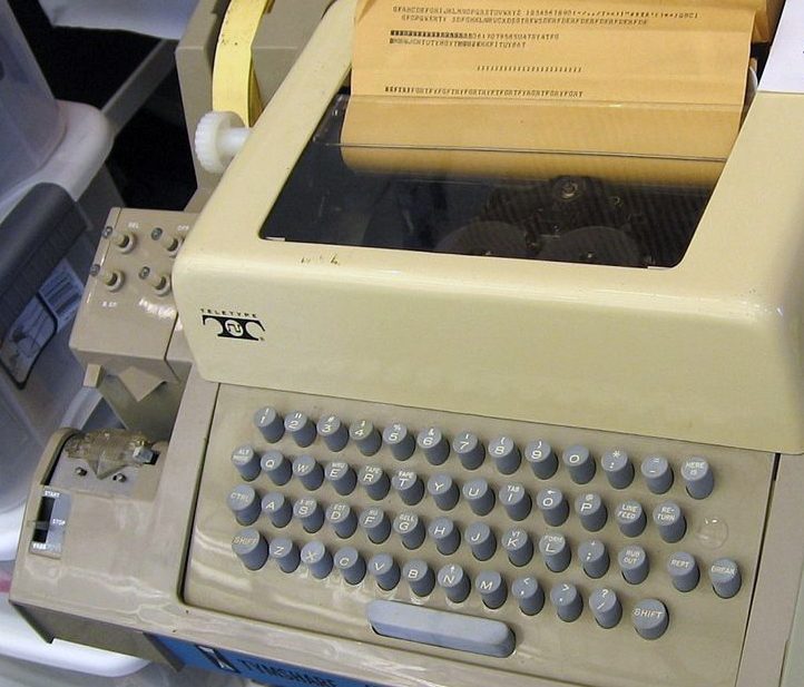 A Teletype Model 33 ASR with paper-tape punch and reader.